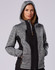 A stylish black and grey workwear jacket with a hood, featuring pockets and a fitted design. It has a logo.