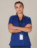 A blue ladies' scrub top with short sleeves, featuring pockets and a lanyard with an ID card.