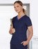 A navy blue scrub top with contrast colour details featuring a V-neckline, worn by a model holding a clipboard.