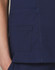 A deep navy scrub top featuring a pocket detail and contrast stitching. Includes a small logo on the garment.