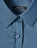 A semi-fitted, cotton-rich stretch shirt in blue featuring a pin dot pattern and button-up collar.