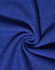 A close-up of textured blue fabric, showcasing the knit pattern of a poly/cotton pique material.