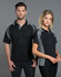 A black and grey men's polo shirt featuring a logo, modelled by a man and woman.