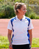 A woman wearing a white polo shirt with blue accents, featuring a logo, smiling outdoors on a sports court.