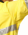 A yellow cotton drill shirt with 3M reflective tape details, featuring a logo on the fabric.