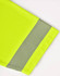 A bright yellow polo shirt featuring a segmented reflective strip on the sleeve. It has a logo on it.