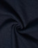 A close-up of dark navy fabric with a smooth, soft texture, showcasing a poly/cotton blend.