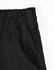 A pair of black unisex cotton stretch drill work pants featuring a cuffed design and an elasticated waistband.
