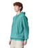 A turquoise adult hooded sweatshirt with a front pocket and a loose fit. The model stands facing to the side.