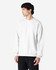 A white Gildan Softstyle adult sweatshirt displayed on a model, featuring a round neckline and long sleeves.