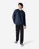 A navy blue Gildan Softstyle adult sweatshirt, shown on a model paired with black pants and sneakers.