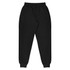 Black tapered fleece kids pants with an elastic waistband and cuffed hems. Features pockets and a brand logo.