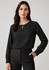 A black long sleeve blouse with a keyhole neckline, paired with tailored trousers. It has a simple, elegant design.