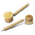 Two bamboo dish brushes with natural bristles, featuring different designs and a logo on one brush.