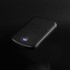 A black wireless charging power bank with a digital display showing battery percentage. It has a sleek, smooth design.