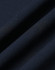 A close-up view of a navy fabric, showcasing a smooth texture with fine diagonal lines. It has a subtle sheen.