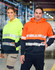 A Hi-Vis two-tone safety hoodie in fluorescent yellow and orange with segmented reflective tape, featuring a logo.