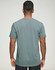 A men's premium cotton short-sleeve tee shirt in a muted green colour, featuring a simple design and a logo.