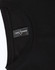 A close-up of a black long-sleeve tee with a round neckline, featuring a branded label inside the collar.