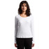 A white long sleeve tee featuring a fitted design and a round neckline, displayed on a model with wavy hair.