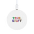 A round wireless charger featuring a white surface with the text "PIXEL SHIFT" displayed in colorful, pixelated letters.