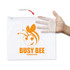 A transparent pencil case featuring a playful bee graphic and the text "BUSY BEE Learning Centres."