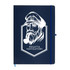 A navy A4 notebook featuring a captain's illustration and a logo, complete with a blue elastic band.