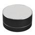 A round black Bluetooth speaker with a perforated silver top, designed for portability and stylish audio delivery.