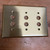3 Gang Pushbutton Switch Plate in Brushed Brass