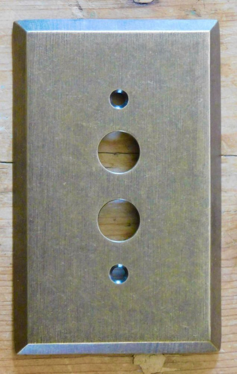 Single Gang Pushbutton Switch Plate in Aged Antique Brass