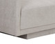 Gannon curved fabric sofa upholstered in Ernst Sandstone with a modern silhouette and fully upholstered base by Be Bold Furniture.