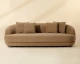 Valentina sofa upholstered in Kona Camel fabric with a gently curved frame, four back cushions, and espresso rubberwood feet by Be Bold Furniture.