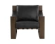 Berke lounge chair in charcoal black top grain buffalo leather with an antique bronze iron frame and leather strap detailing by Be Bold Furniture.