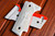 Beretta 92 "VERITAS AEQUITAS" shown in ivory with an orange liner