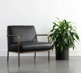 K1329 Rich Black Pebble shown on Mid century chair