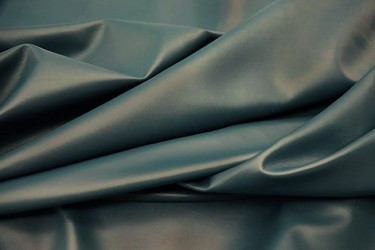 Picture of Teal Surprise nappa leather for upholstery showing smooth grain.