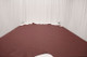 Wine Country soft, nappa leather hide for upholstery displayed on a table 