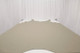 Chamomile soft, nappa leather hide for upholstery displayed on a table 