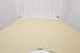 Almond soft, nappa leather hide for upholstery displayed on a table 