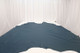Picture of Rockin Blues, real blue leather hide for upholstery displayed on a table.
