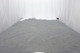 Smoke Rings distressed leather hide for upholstery displayed on a table