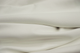 Close-up picture of Snow White, rich white genuine leather for chairs, sofas and other furniture upholstery. 