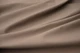 Picture of draping Moonlight Grey, light grey cowhide leather for upholstery and furniture.