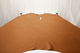Picture of Bourbon Street, bourbon semi-aniline leather hide for upholstery displayed on a table