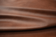 Picture of draping Whiskey Beat, rich warm brown genuine cowhide leather for upholstery