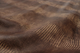 Picture of draping Mojave Lizard embossed leather for upholstery and furniture.