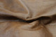 Close up picture of Back Country Brown, a rustic brown  leather and nap texture.