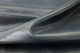 Close up picture of dark steel blue smooth grain leather for upholstery