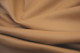 Close up picture of warm golden tan smooth leather for upholstery