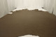Warm mushroom nappa like upholstery leather displayed on a table